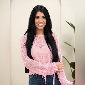 Lightweight, relaxed pink sweater